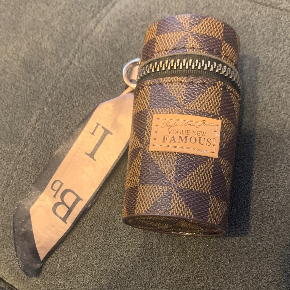 Checkered Brown and Tan Cylinder Bag